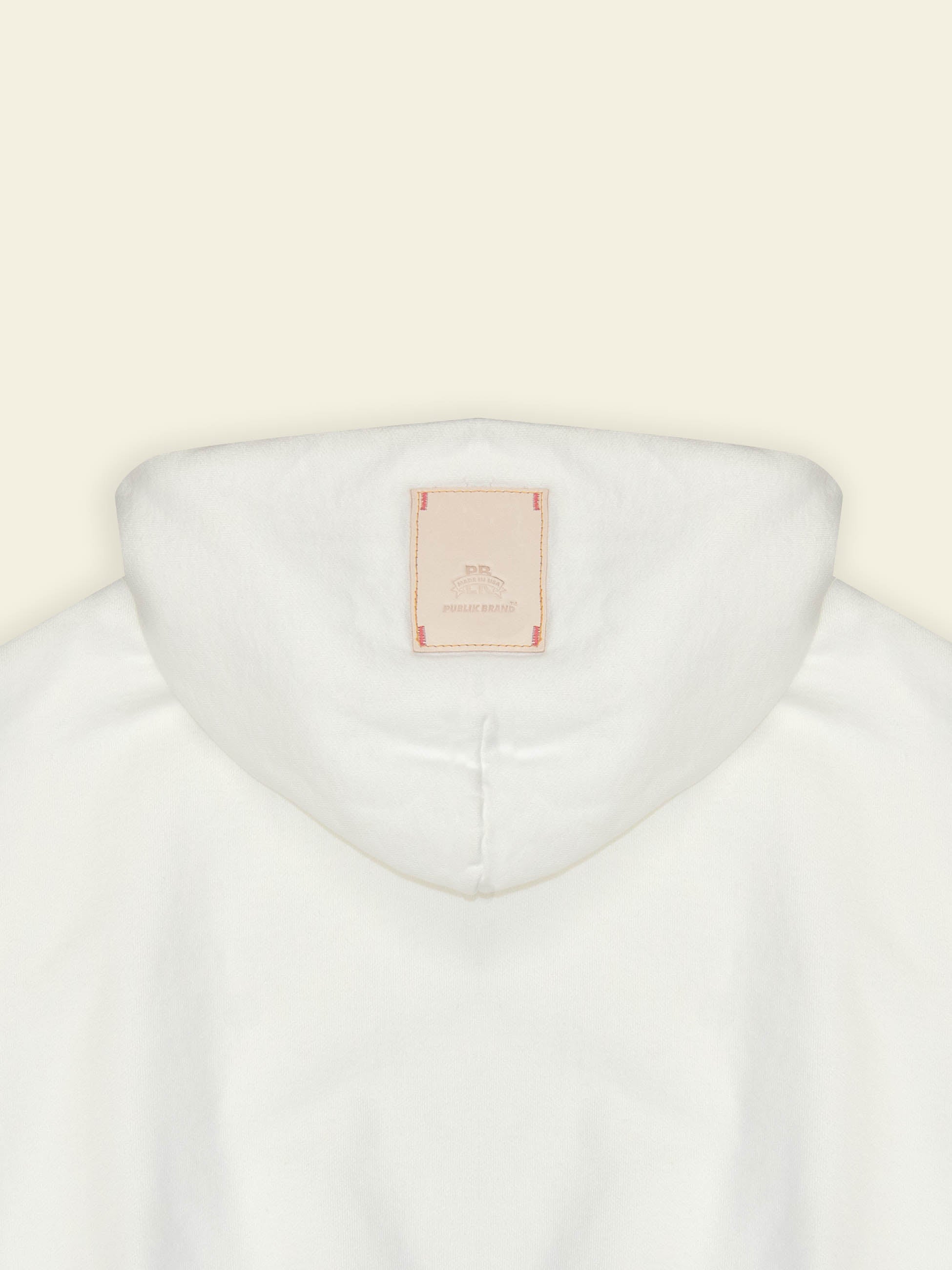 Publik Brand Double Layered Hoodie Acoustic White Heavyweight Fleece, all made in USA back side detail with the brand logo leather patch