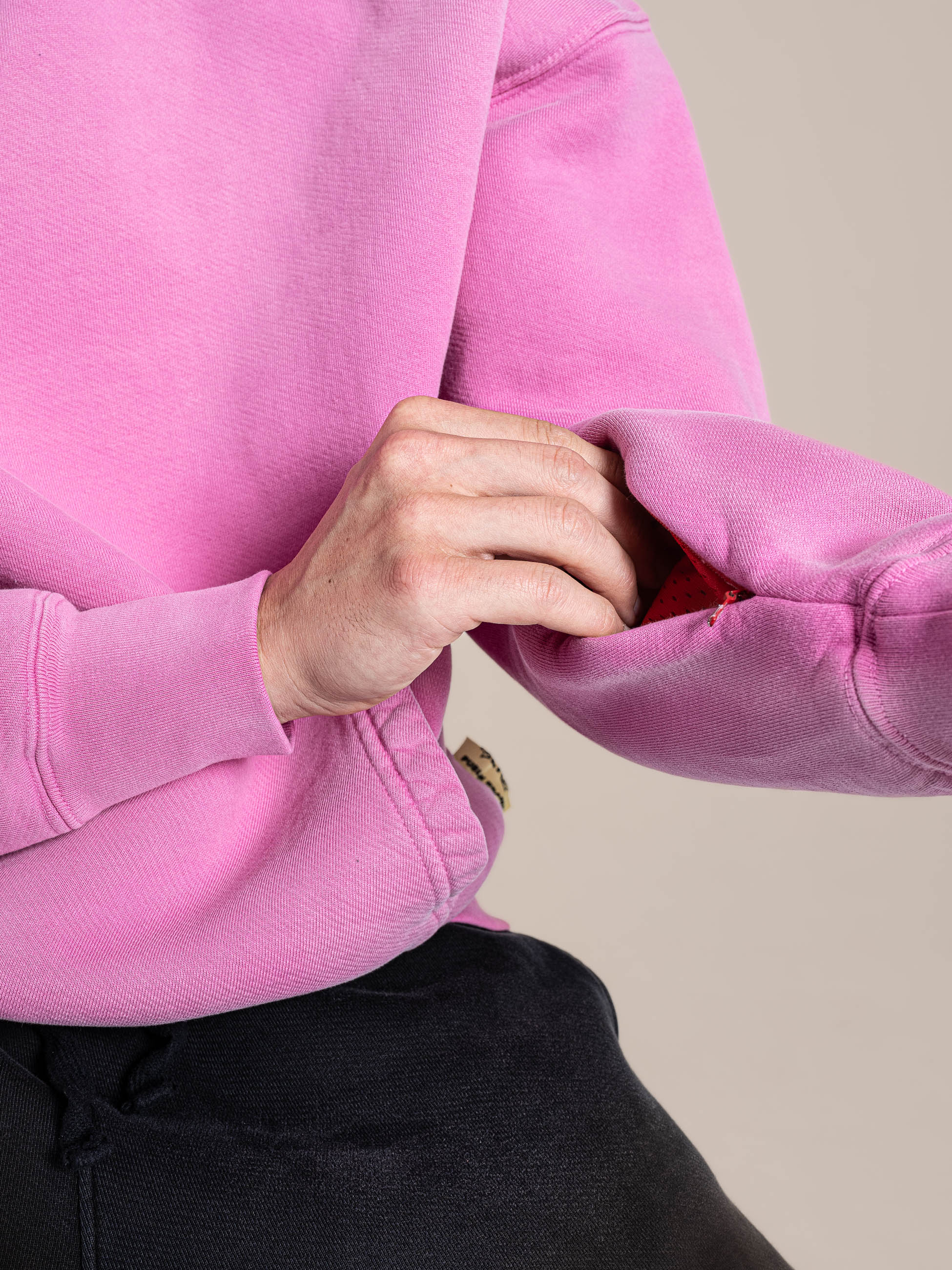 open hidden pocket at left arm