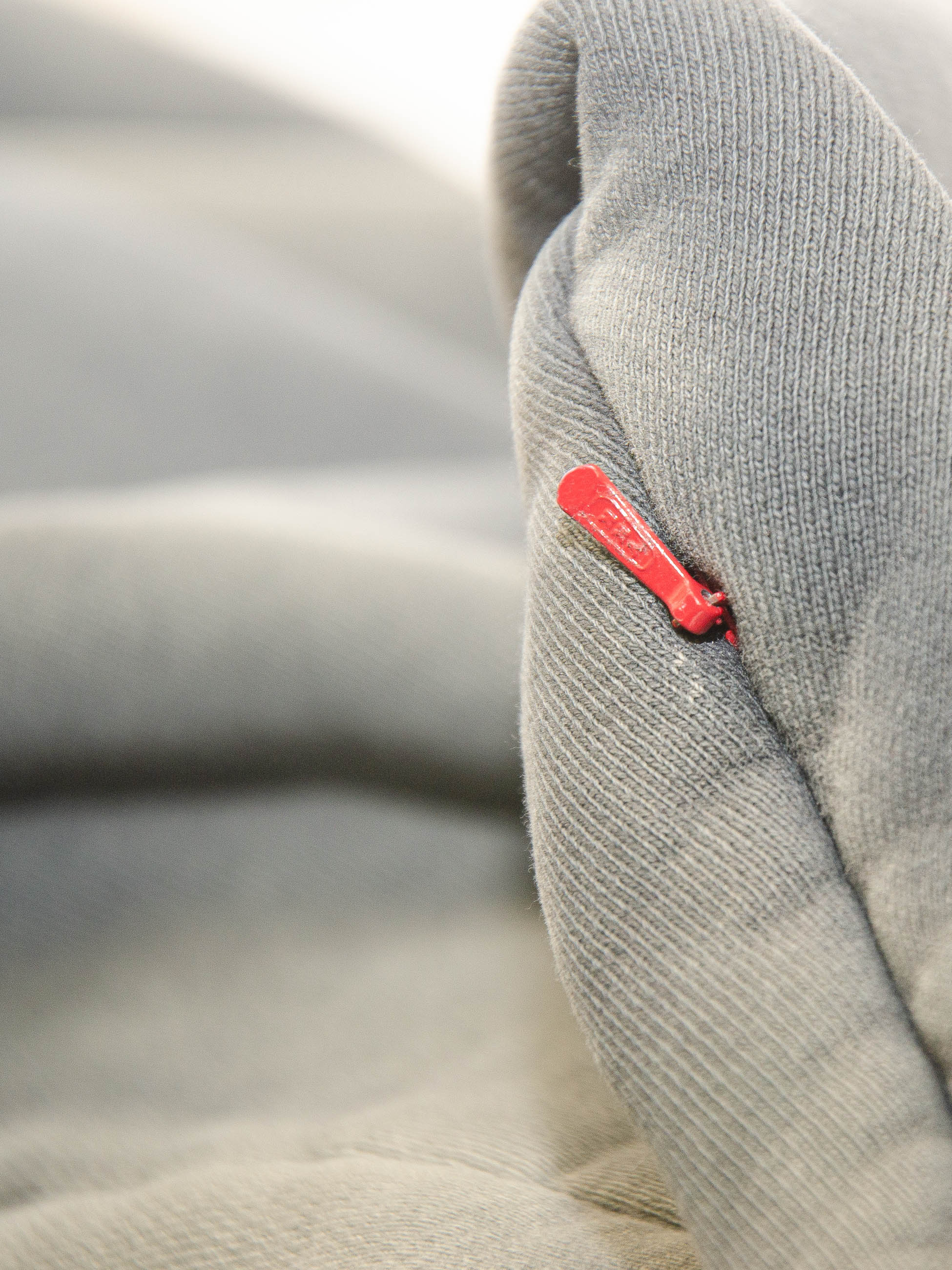 closest shot of a hidden zipper at left arm Luxury Made in USA