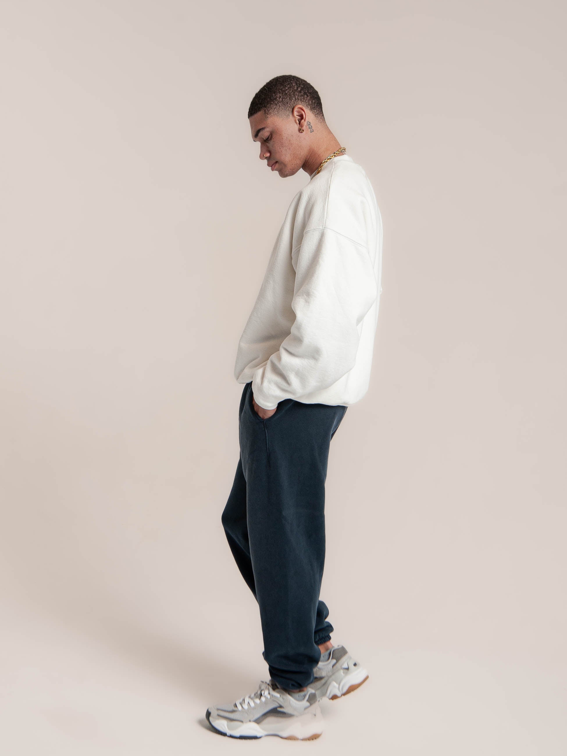 male model wears Publik Brand Double Layered Sweatshirt Crewneck Acoustic White Heavyweight Fleece, all made in USA