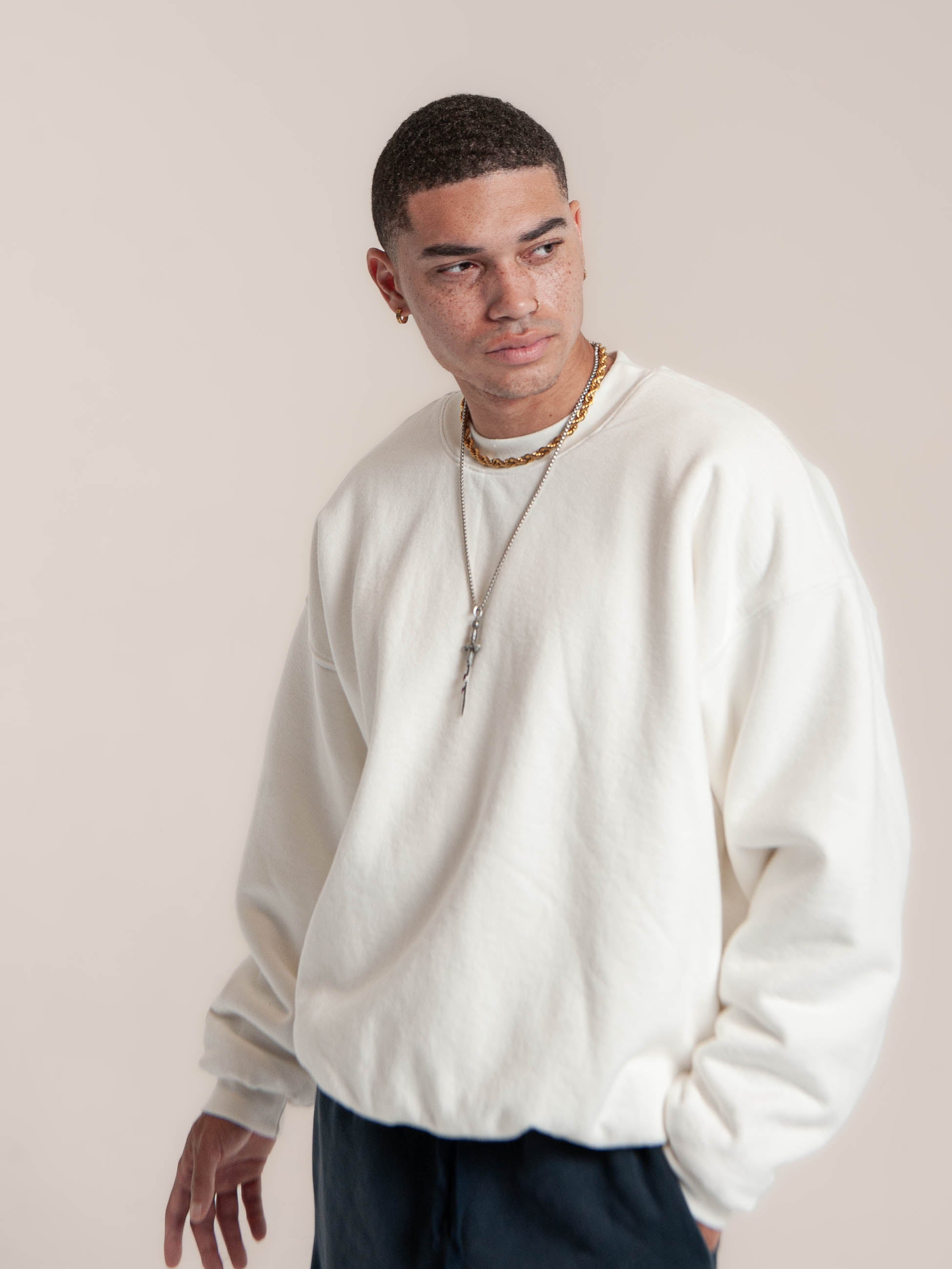 male model wears Publik Brand Double Layered Sweatshirt Crewneck Acoustic White Heavyweight Fleece, all made in USA