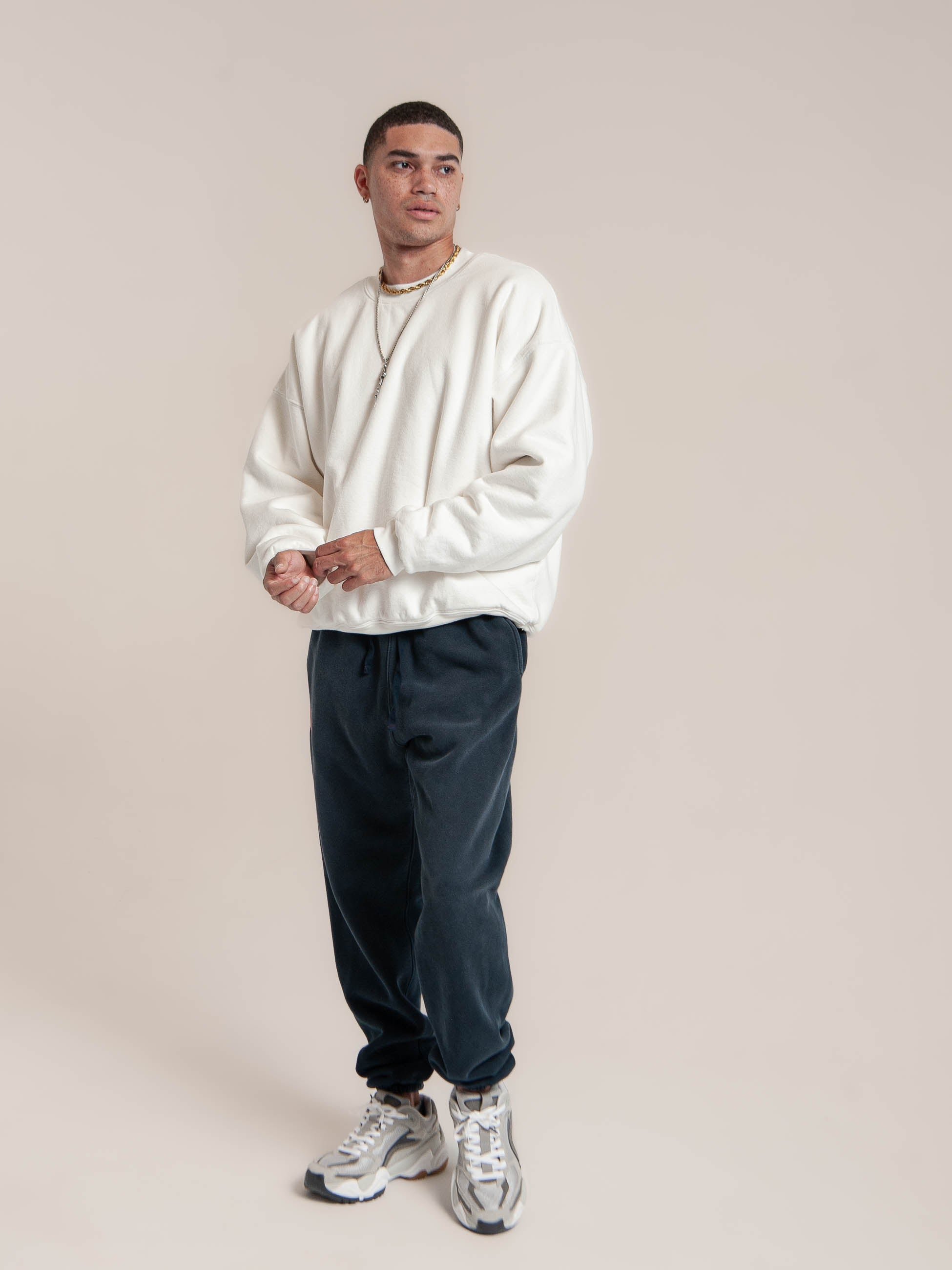 male model wears Publik Brand Double Layered Sweatshirt Crewneck Acoustic White Heavyweight Fleece, all made in USA