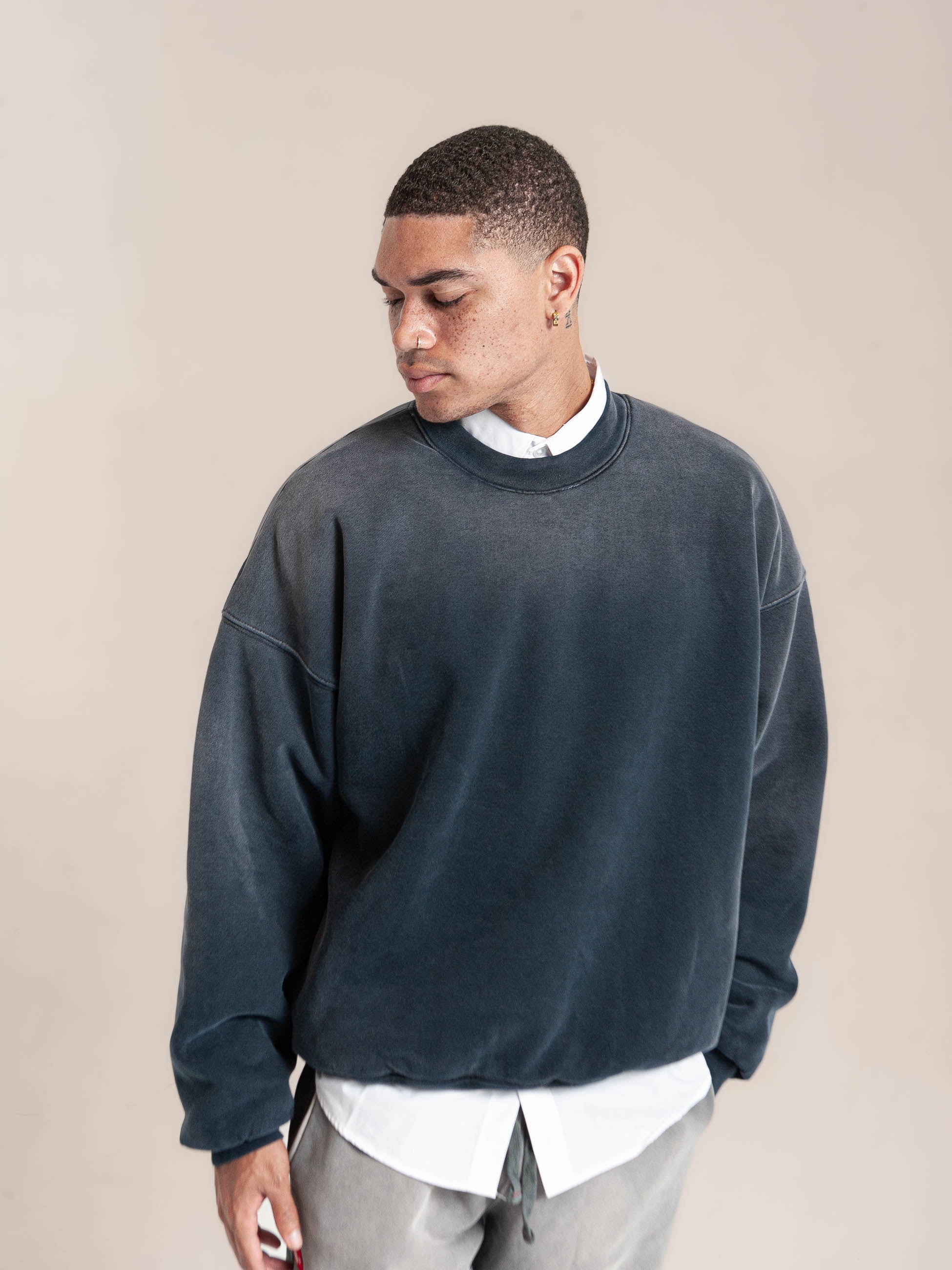male model wears Publik Brand Double Layered Sweatshirt Crewneck College Navy Heavyweight Fleece, all made in USA