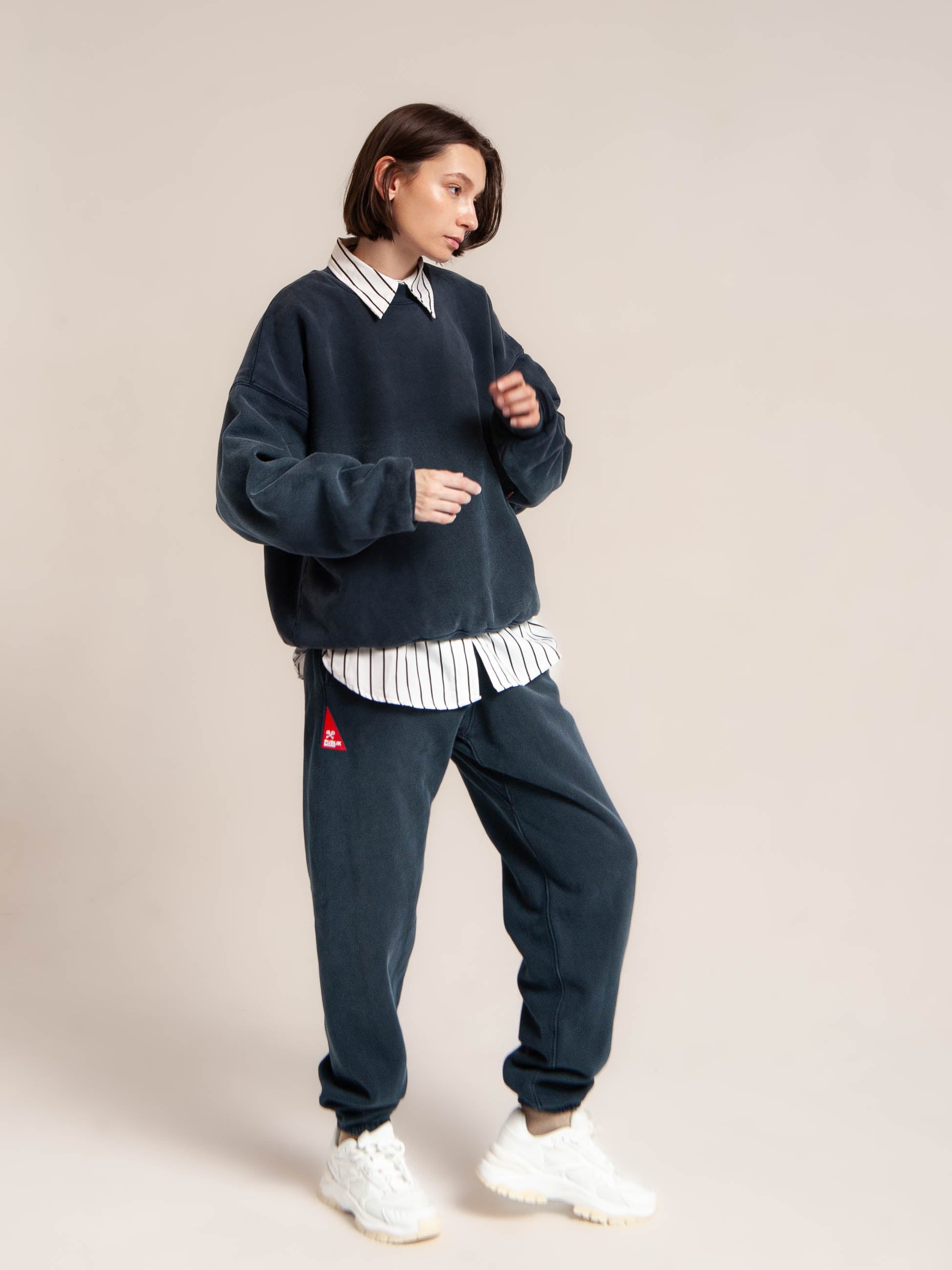 female model wears Publik Brand Double Layered Sweatshirt Crewneck College Navy Heavyweight Fleece, all made in USA