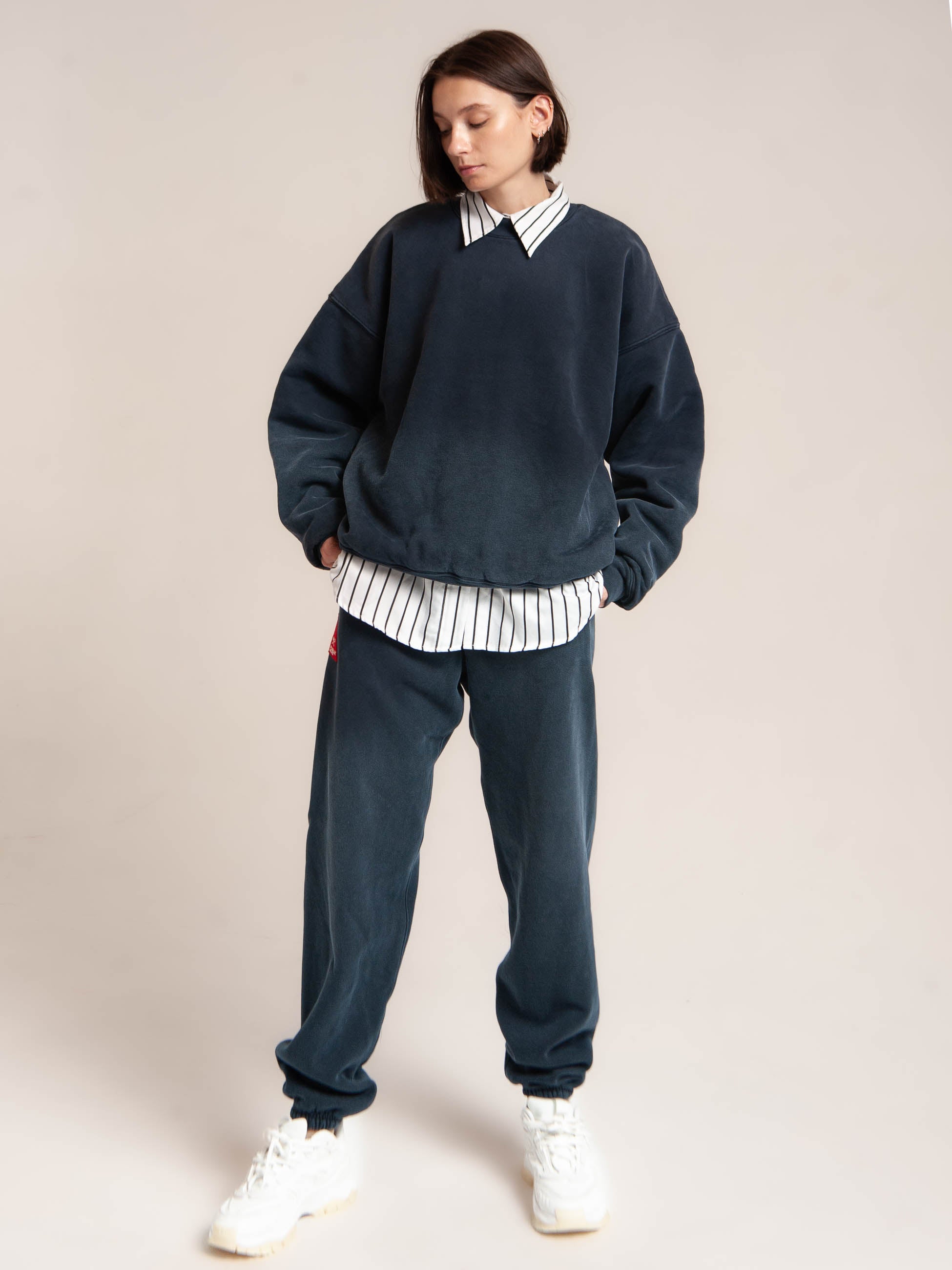 female model wears Publik Brand Double Layered Sweatshirt Crewneck College Navy Heavyweight Fleece, all made in USA