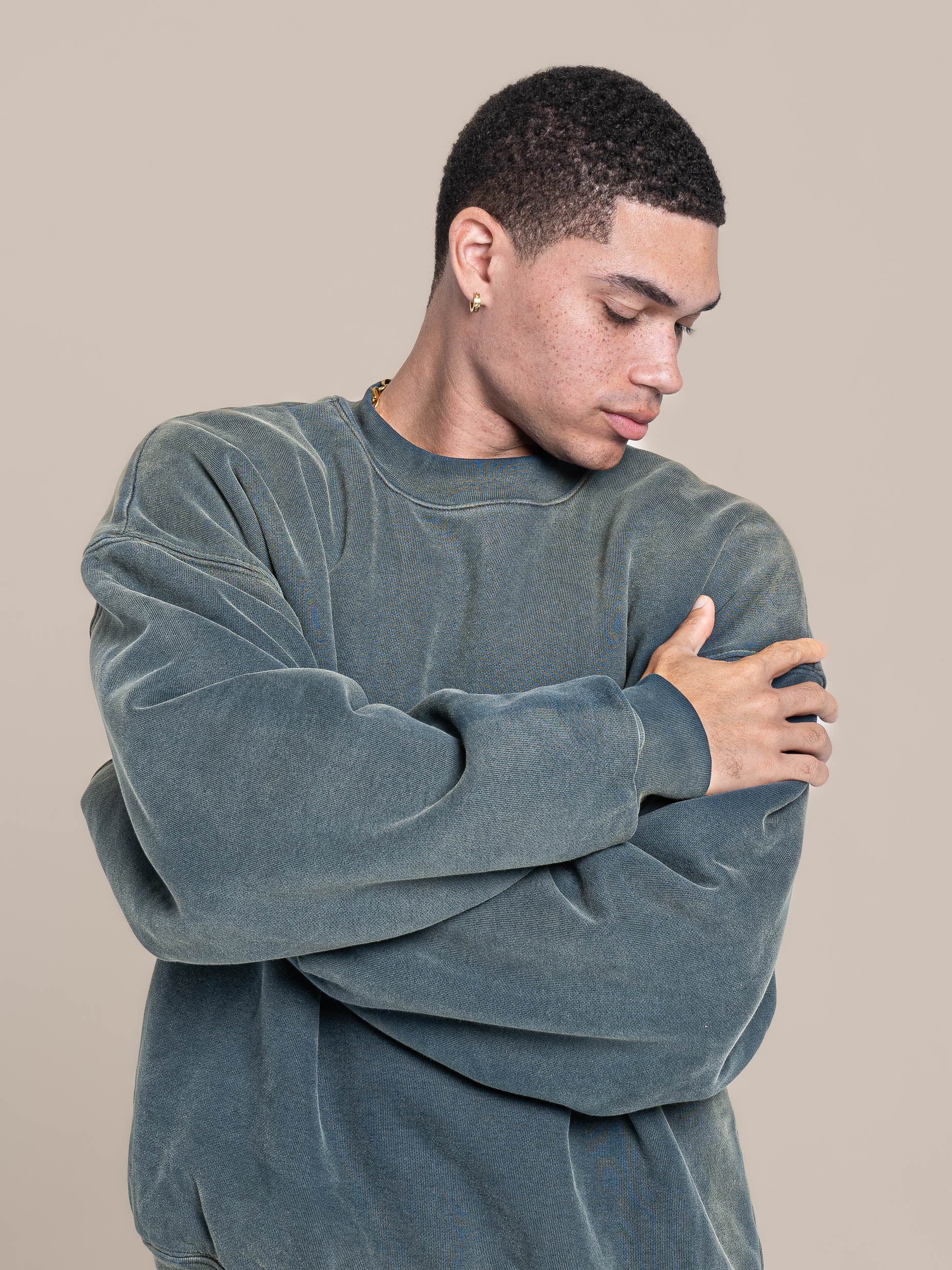 male model wears Publik Brand Double Layered Sweatshirt Crewneck Indigo Heavyweight Fleece, all made in USA