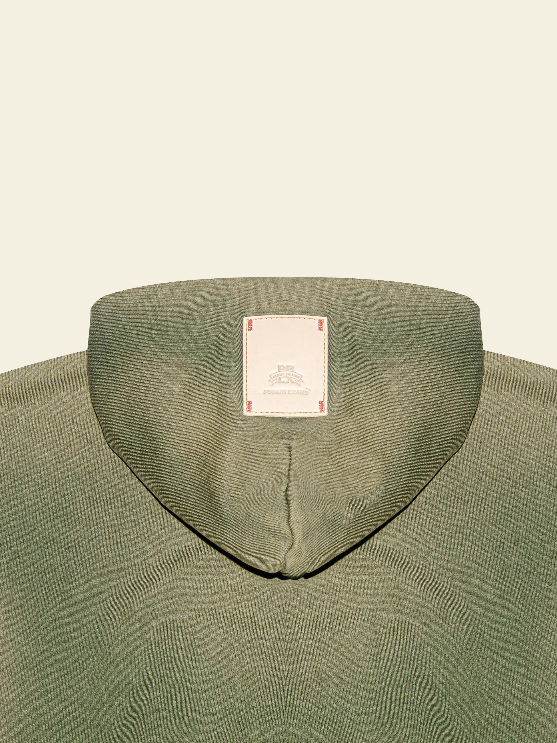 Publik Brand Double Layered Hoodie Reseda Green Heavyweight Fleece, all made in USA, detail with the logo leather patch