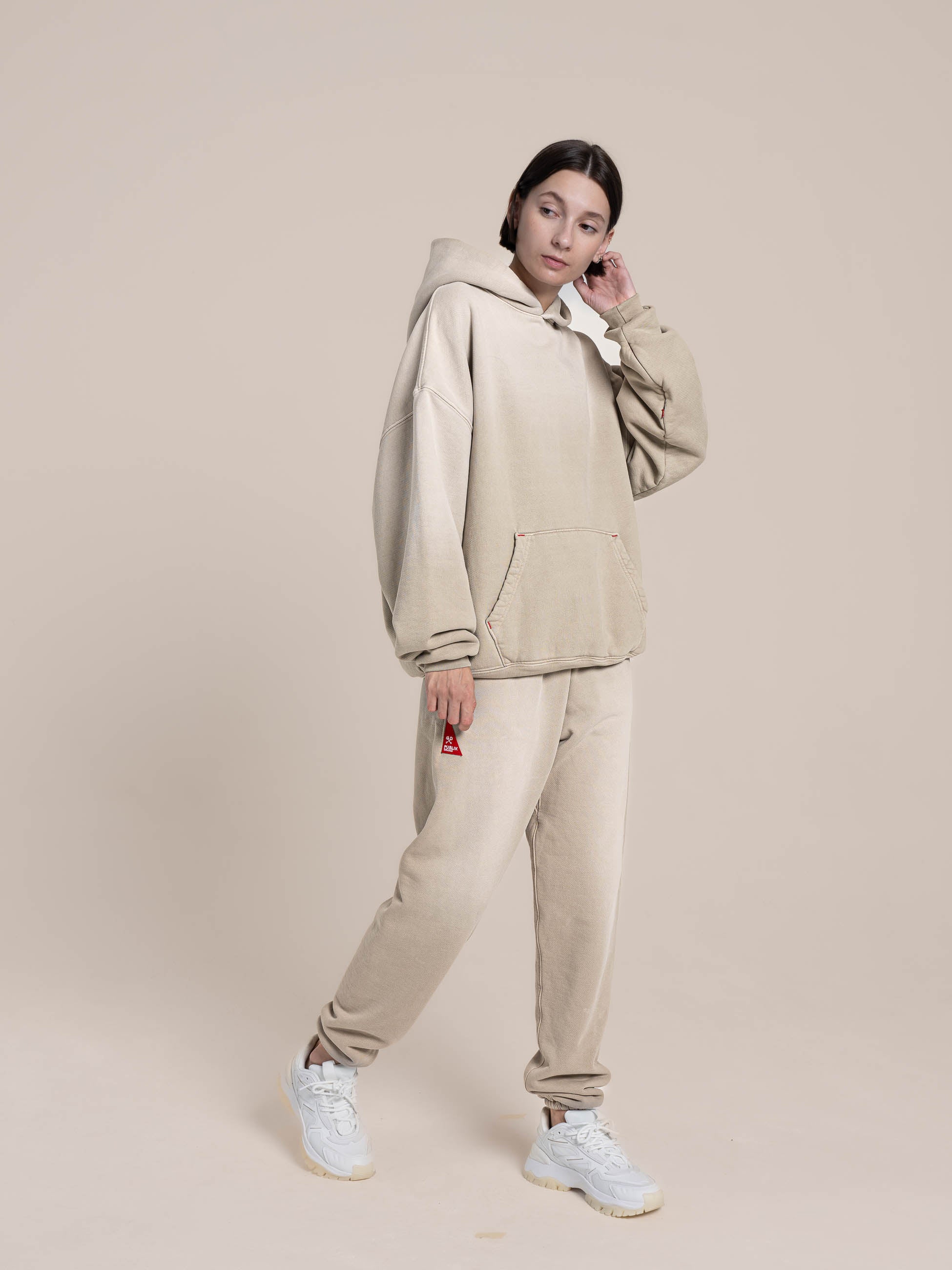 female model wears Publik Brand Single Layered Hoodie Old Wood Heavyweight Fleece, all made in USA