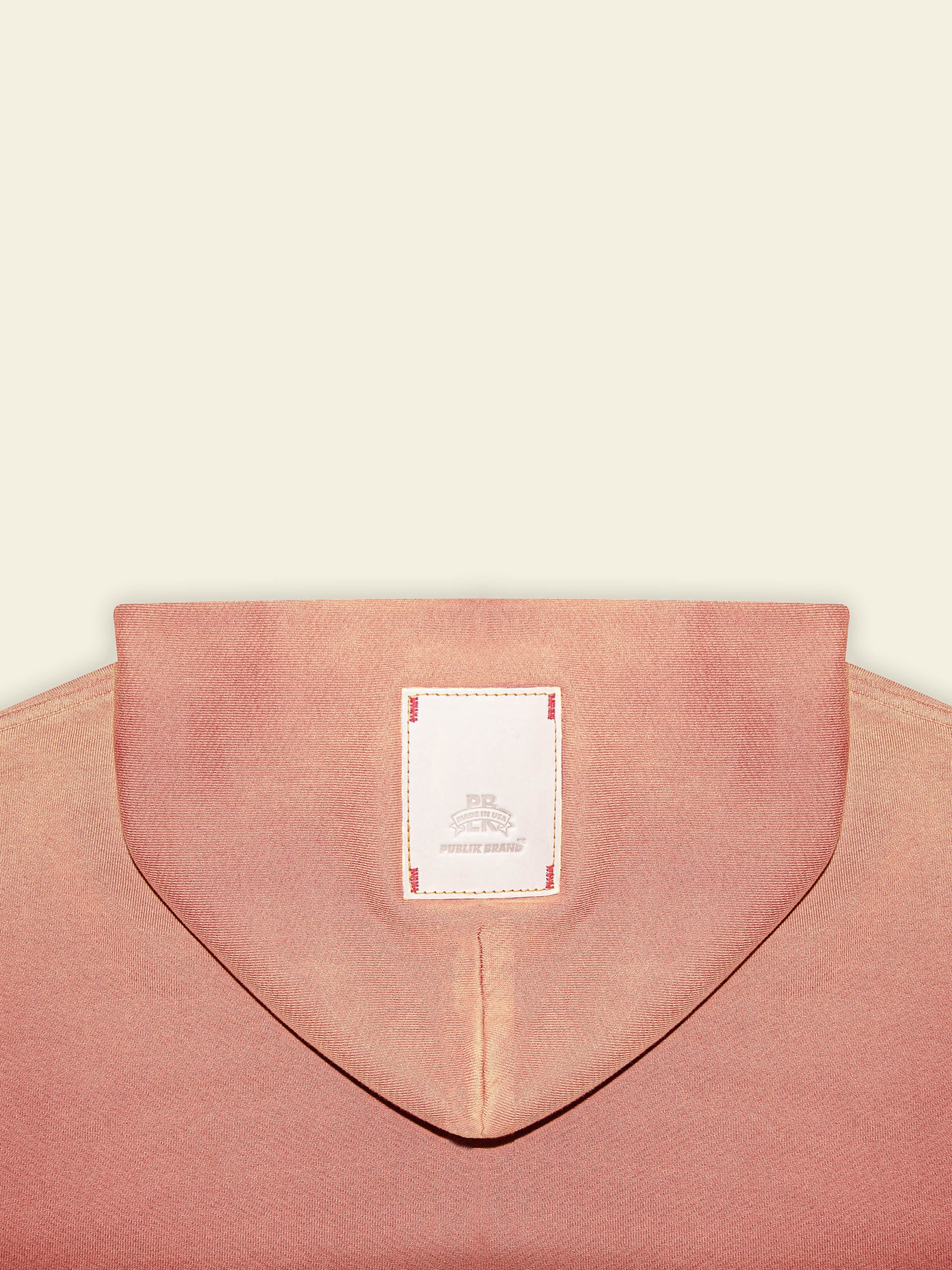 Publik Brand Double Layered Hoodie Tea Rose Red Heavyweight Fleece, all made in USA, back detail view with the brand logo leather patch
